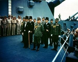 Shigemitsu (with cane) on USS Missouri, Tokyo Bay, 2 September 1945 (Wikipedia Commons)