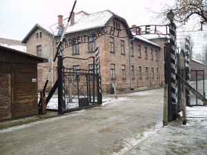 The Gates of Auschwitz, with the slogan "Arbeit Macht Frei." (Wikimedia Commons)