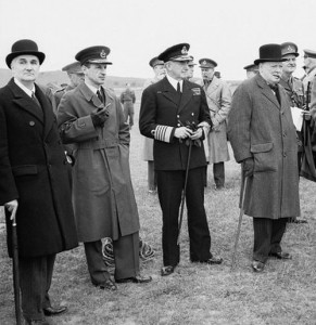 Lindemann, Air Marshal Portal, Admiral Cunningham and Churchill watching an antiaircraft gunnery exhibition, June 1941. (Imperial War Museum)